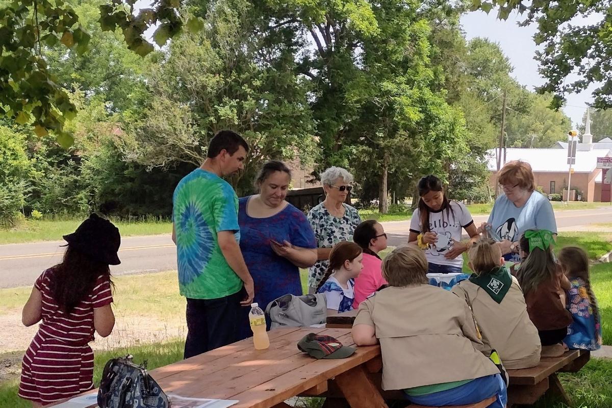 The afternoon shade under the sycamore tree makes the perfect spot for messy activities. 